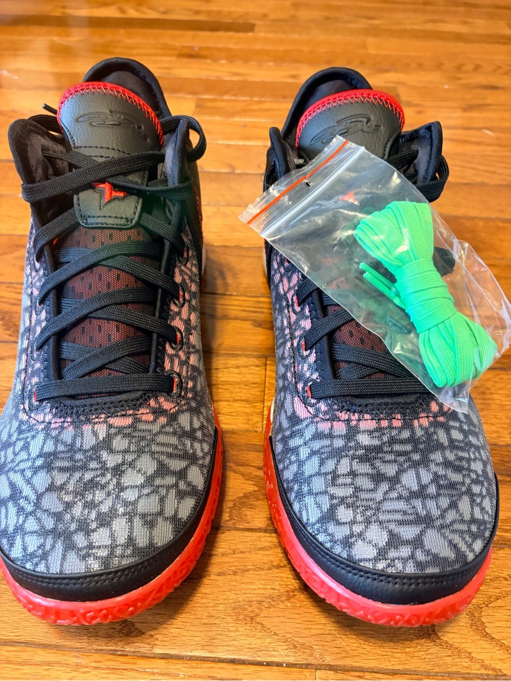 Men's Athletic Shoes in Black and Red with Green Laces zoom LeBron nxxt gen